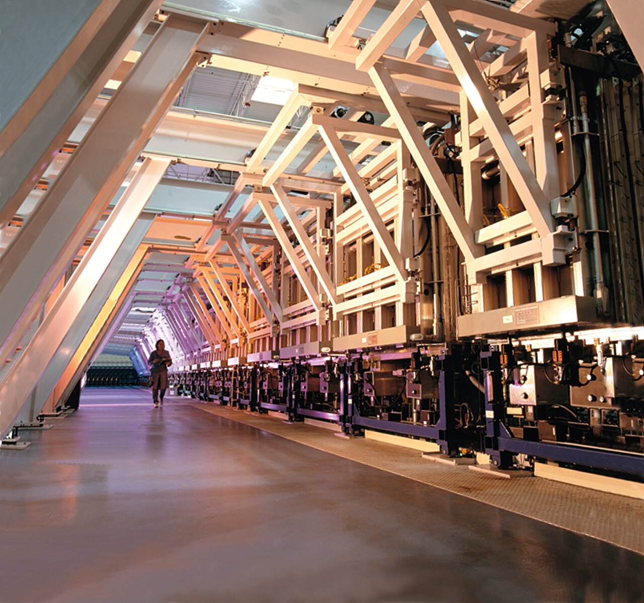 Long automated photovoltaic module production line inside a factory